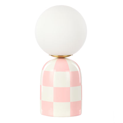 Archie pink and white checkerboard table lamp with round glass shade