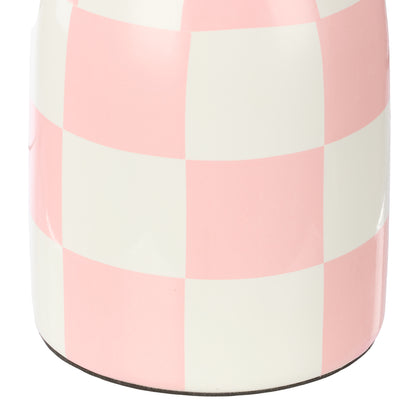 Close-up of Archie pink and white checkerboard ceramic lamp base