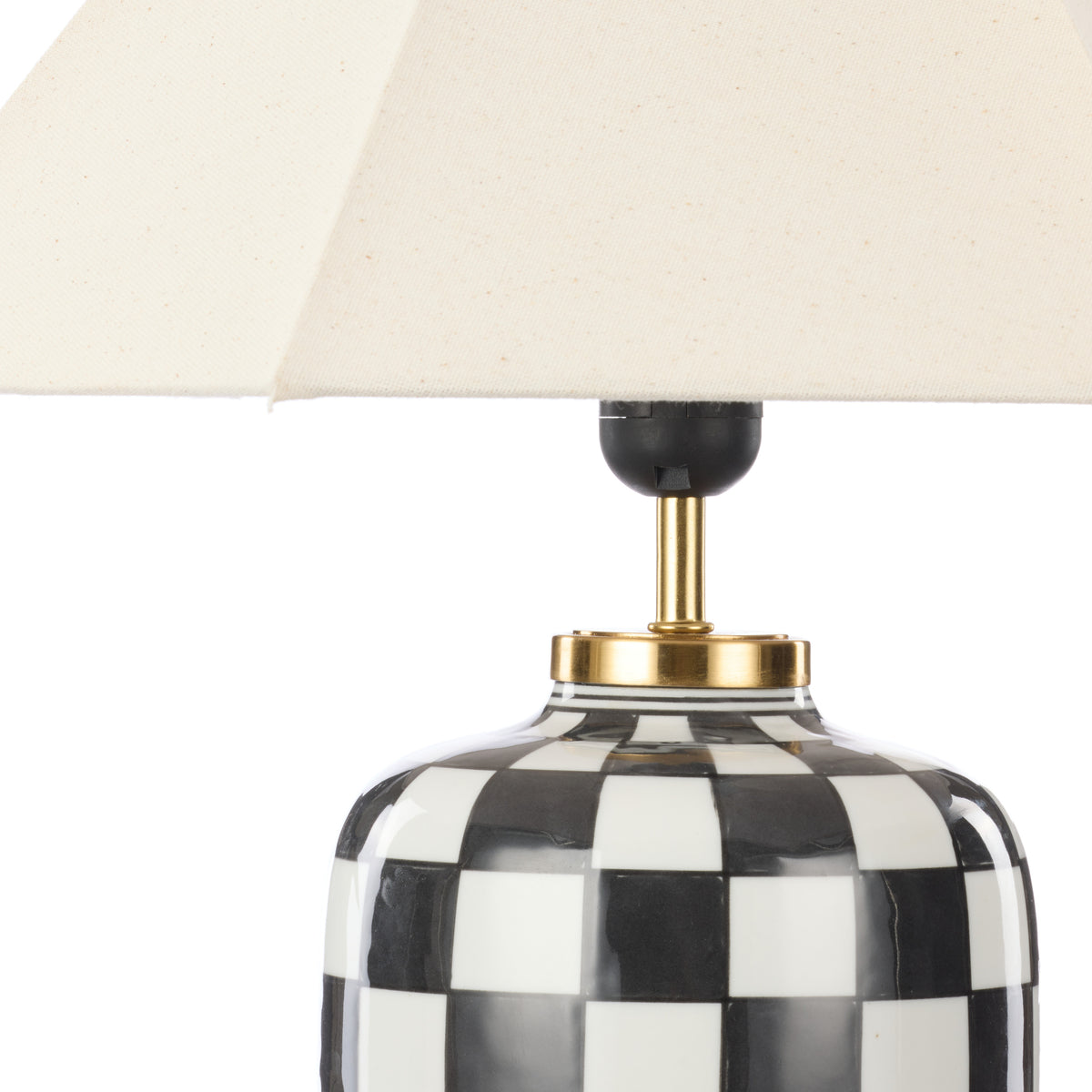 Close-up of Haynes linen shade and checkerboard ceramic lamp base